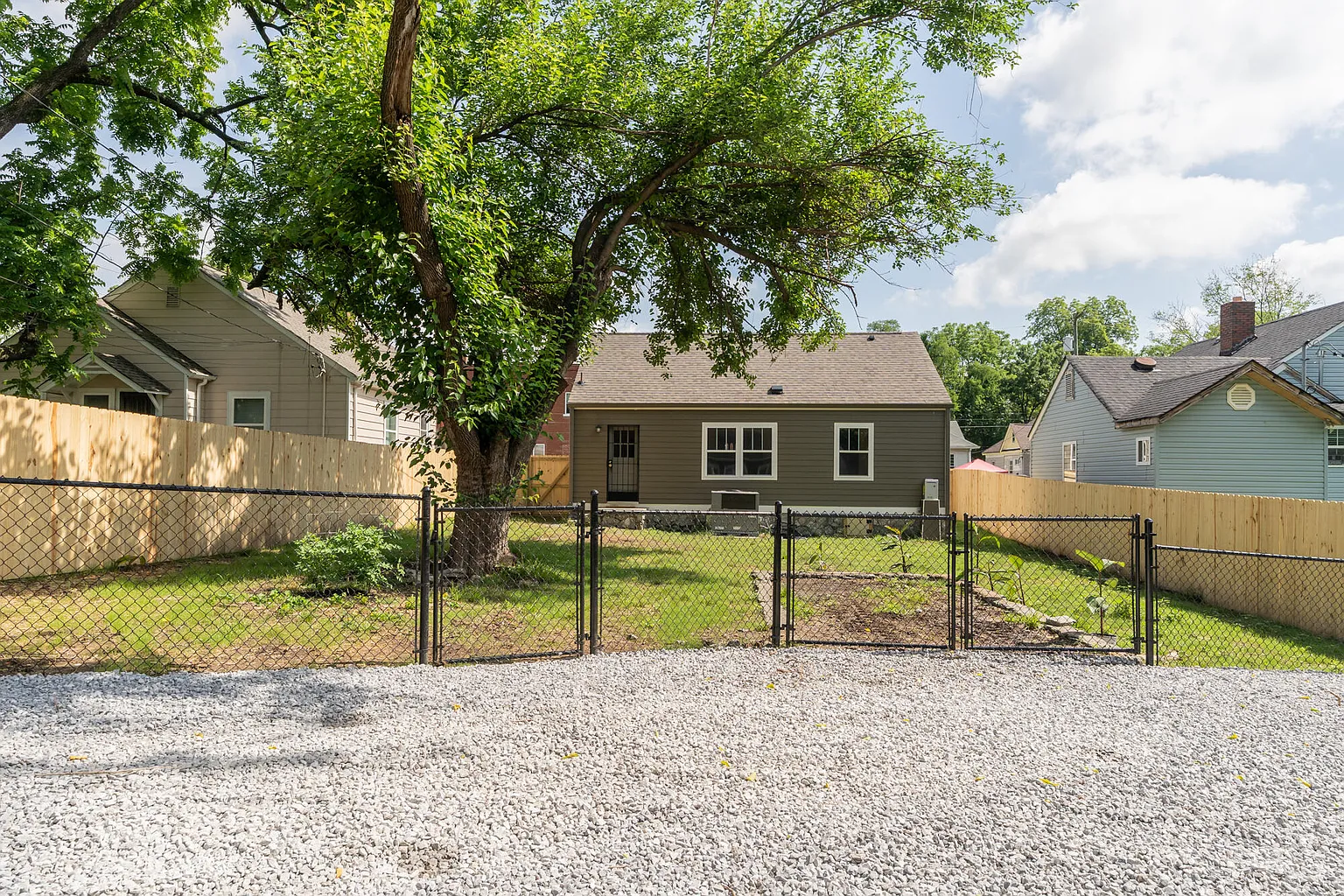 2202 Chamberlain Ave: the completed rear yard and house