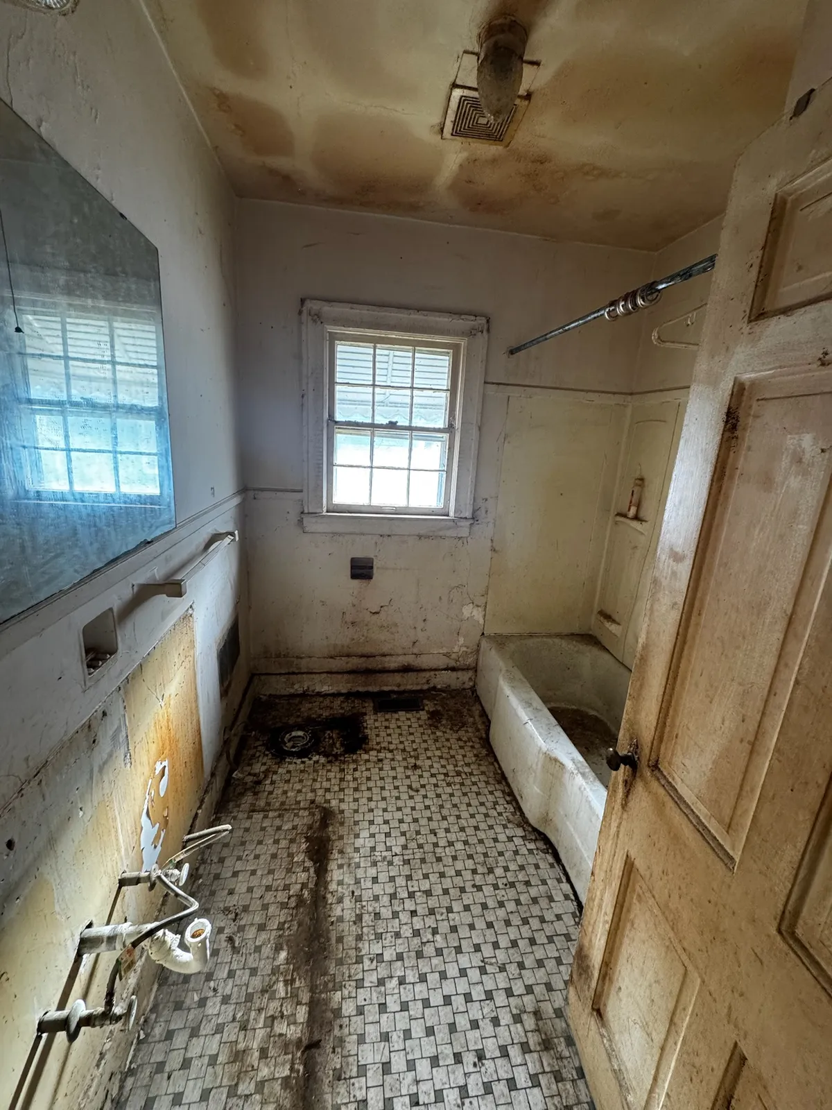 Bathroom at 2202 Chamberlain Ave before restoration